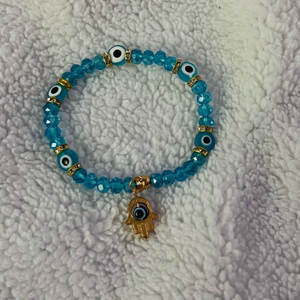 Stretchy 🧿 evil eye protection bracelet with hamsa charm
